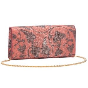 New . Genuine shagreen, stingray, print clutch .